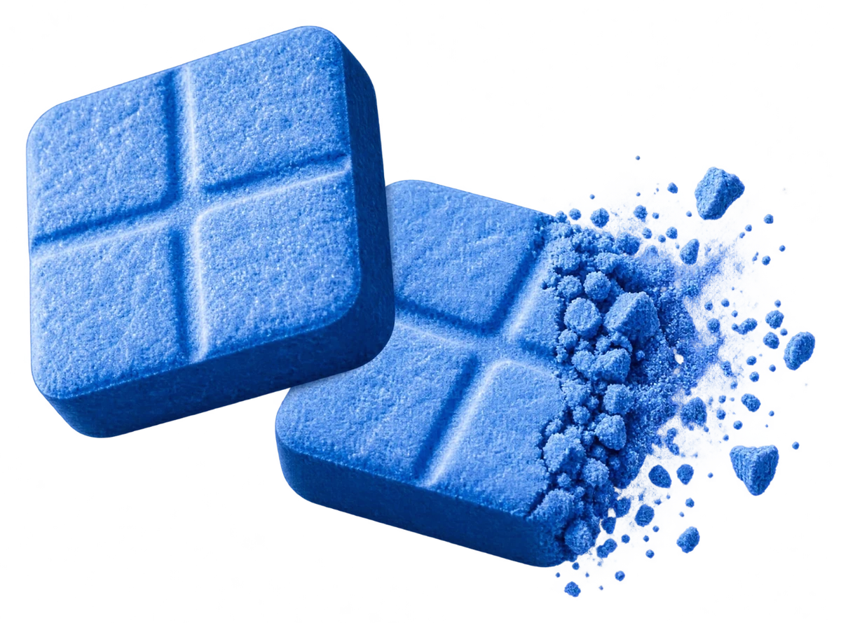 Two rapid-dissolve tablets, one breaking down into fine powder